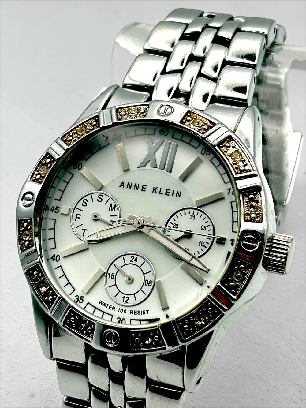 Anne Klein AK/1001 Womens Watch Multifunction Crystal Bezel Silver Tone Bracelet
